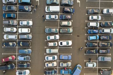 Premium Photo Top View Of Many Cars Parked On A Parking Lot