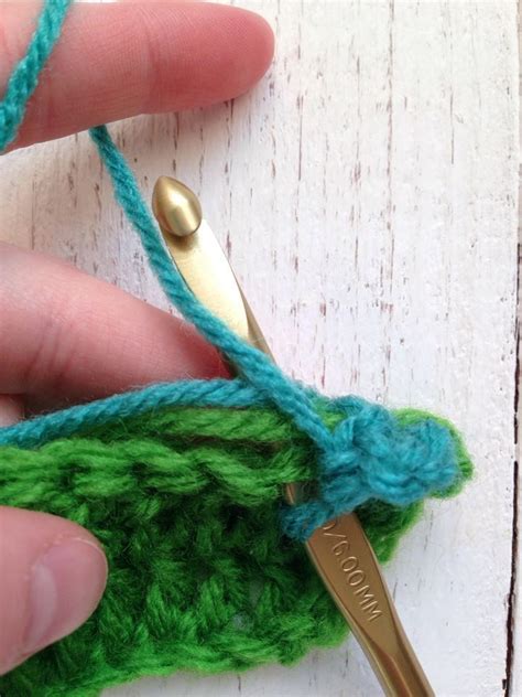 Thread the end yarn into the needle and insert it into the next set of stitches heading in the opposite direction from where your end thread is. How to Weave in Ends As You Go - | Crochet weaves, Weaving ...