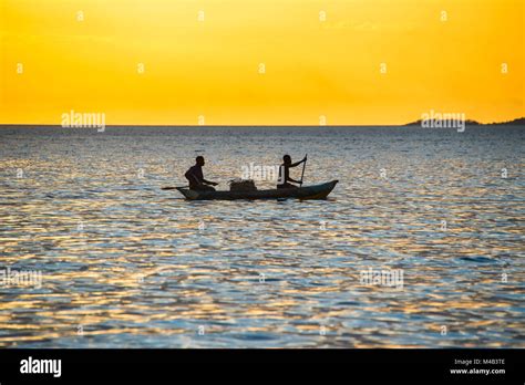 Backlight Of A Fishermen In A Little Fishing Boat At Sunsetlake Malawi