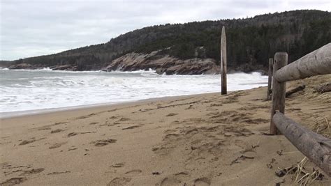 Waves Of The Ocean Crashing On Shore With Skies In Acadia National Park