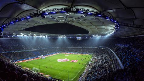 Night View Of Crowded Volksparkstadion Soccer Stadium Before The Match