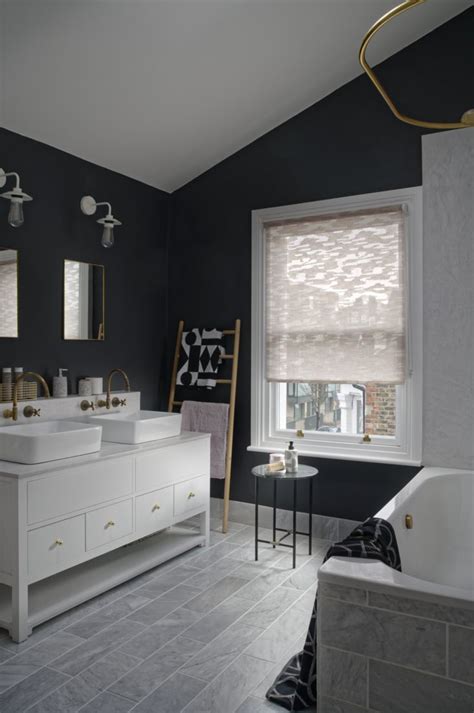 Dark blue shaker bath vanity washstand with brass hexagon pulls and a white quartz countertop finished with a rectangular beaded mirror. Dark Blue Bathroom Ideas | Inspiration, Badrum