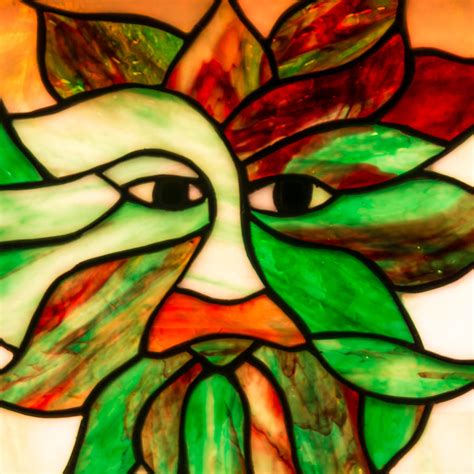 stained glass green man photograph by christopher burnett
