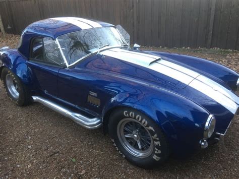 Despite its huge success on track and popularity (over 60,000 replicas have been built. 1965 Shelby Cobra Superformance MKIII Carroll Shelby ...