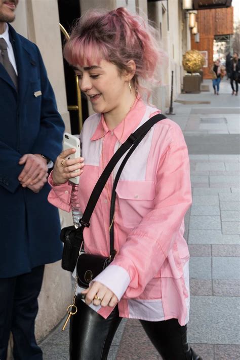 Maisie Williams Wears A Pink Shirt To Match Her Pink Hair While Out In