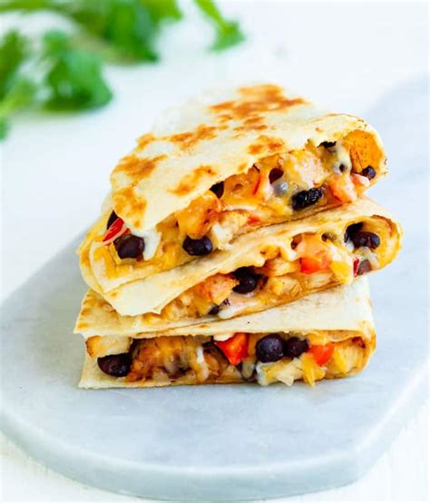 They are always on our recipe rotation because the entire family loves them. Chicken Quesadillas - The Cozy Cook