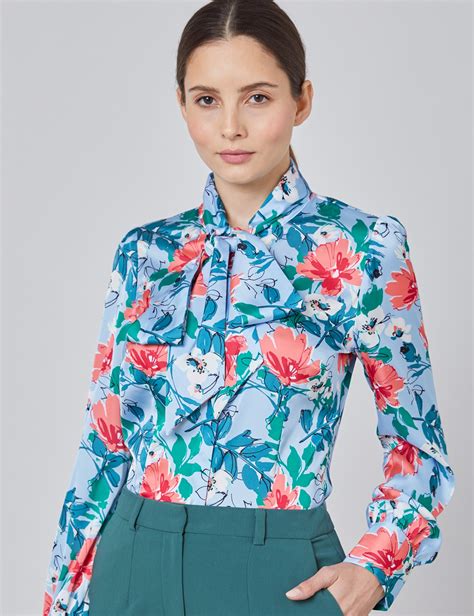 satin women s fitted shirt with floral print and pussy bow in blue and pink hawes and curtis uk