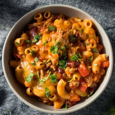Cook the pasta uncovered, stirring occasionally, until the pasta has cooked through, but is still firm to the bite, about 8 minutes. Cheesy Chili Pasta Casserole | Walking On Sunshine Recipes