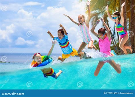 Kids Jump Into Swimming Pool Summer Water Fun Stock Image Image Of