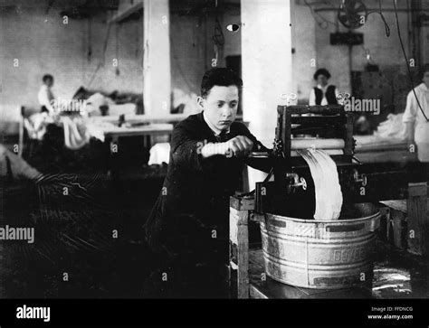 Hine Child Labor 1917 Na 14 Year Old Boy Wringing Curtains At A