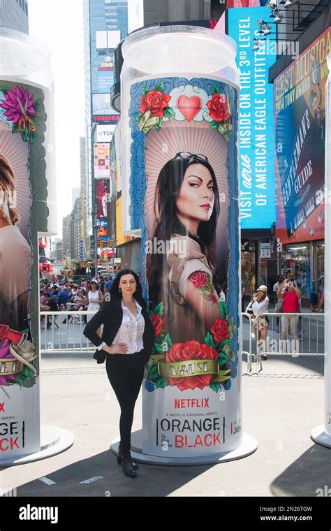 Laura Prepon Poses At The Orange Is The New Black Times Square Take