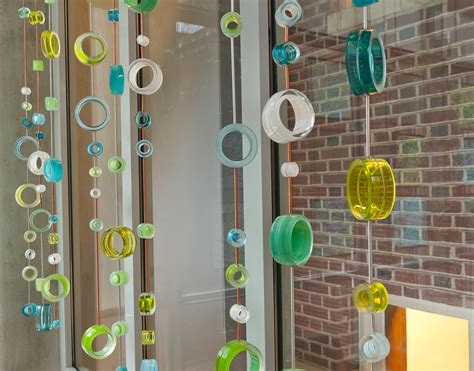 Fused glass wall hangings including hangings with hearts, stars and much more. Custom Glass Circles, Hanging Sculpture by Wolf-Mattick ...
