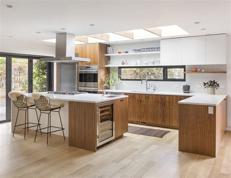 The kitchen range, by big chill, adds a little retro flair with modern conveniences. 25 Memorable Midcentury Modern Kitchen Renovations - Dwell