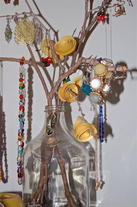 These are items that are inexpensive. DIY Tree Branch Jewelry Holder | Tree branch jewelry holder, Craft show ideas, Diy jewelry holder