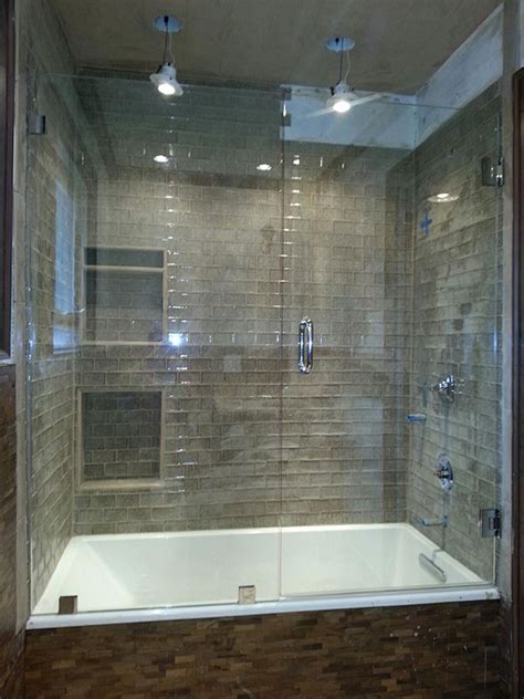 A brand new design is a fixed panel on either end with a pair of doors between. Frameless Shower Doors | Custom Glass Shower Doors Atlanta, GA