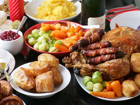 A typical british christmas dinner would include turkey, stuffing and cranberry sauce as well as brussels sprouts and pigs in blankets (not since the rules that govern ordinary dinners don't apply on christmas day, christmas dinner crackers have become commonplace on tables around england. The foods you'll be eating most of this Christmas | English christmas dinner, Dinner, Christmas ...