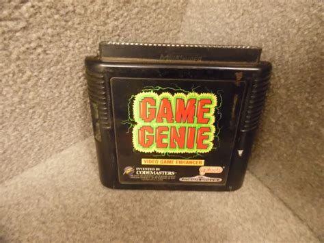 Game Genie Sega Genesis Video Games Amazonca