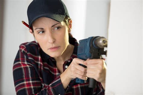 Serious Woman Using A Cordless Drill Photo Background And Picture For Free Download Pngtree