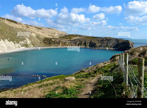 Lulworth Cove And The Jurassic Coastline Showing The Cove Cretaceous