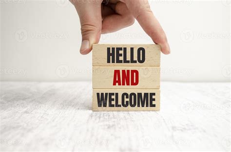 Hello And Welcome Symbol Concept Words Hello And Welcome On Wooden