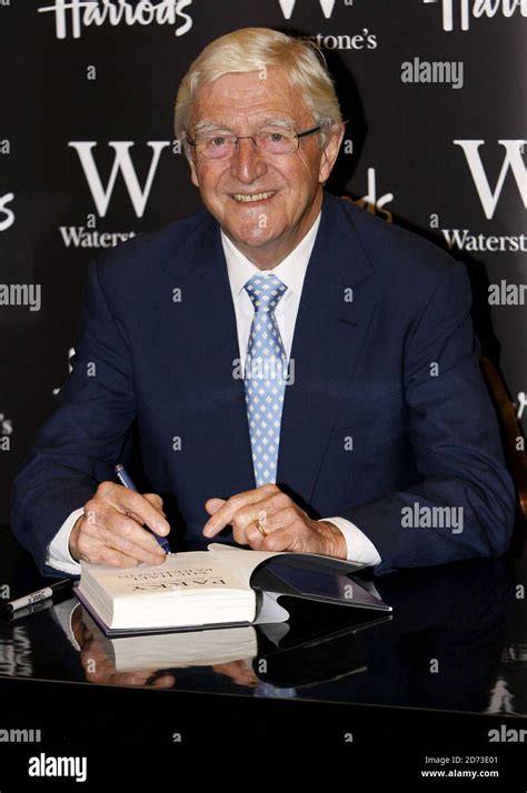 Sir Michael Parkinson Signs Copies Of His Autobiography Parky At Waterstones In Harrods