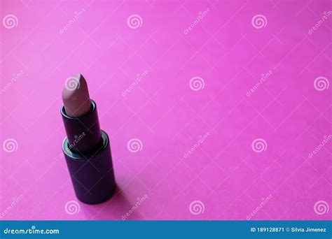 Close Up Of Color Nude Lipstick On A Pink Background Copy Space And