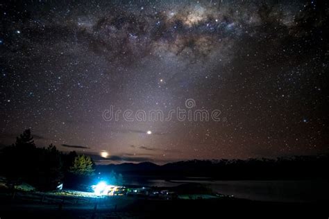 Beautiful Milky Way Starry Night Over The Snow Mountain At Lake Pukaki