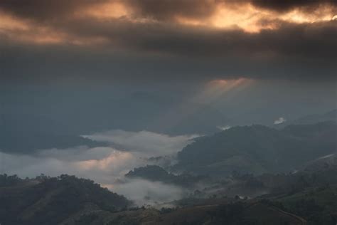 Premium Photo Beautiful Sunlight Ray Over A Mountain Range And Sea Of