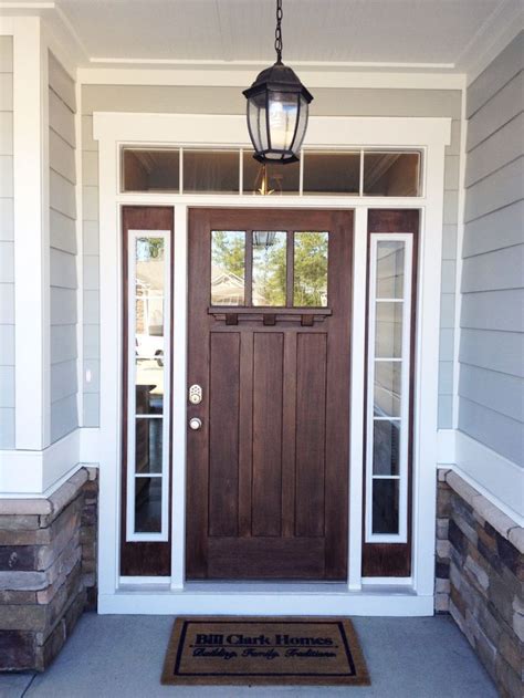 Go For A Rich Dark Wood For Your Front Door To Make A