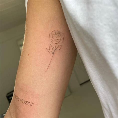 Fine Line Rose Tattoo On The Inner Arm