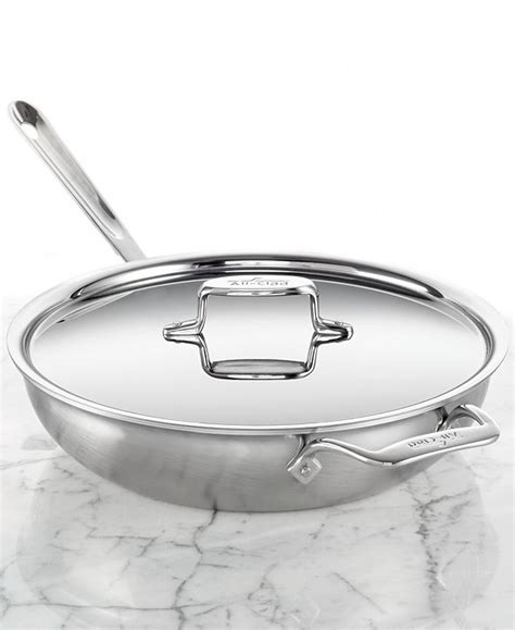 This versatile piece features a large surface area and tall. All-Clad D5 Brushed Stainless Steel 4-Qt. Covered ...