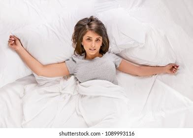 Sensual Woman Lying Bed Outstretched Hands Stock Photo Shutterstock