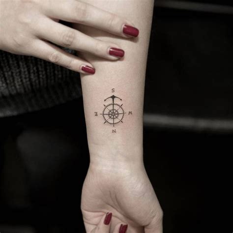 Anchor with compass tattoo on left forearm. Tiny compass tattoo Tiny compass tattoo on the left inner ...