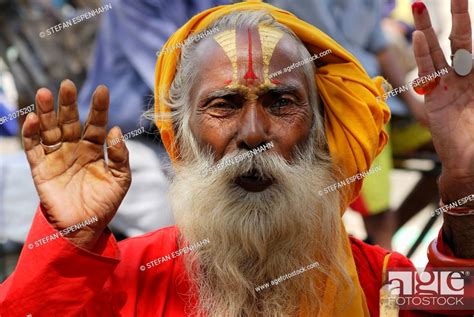 Holy Man Sadhu With A Painted Face And A Long Beard Durbar Square