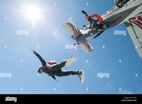 A Freestyle Skydiving Team Exiting From A Pilatus Porter For A Training