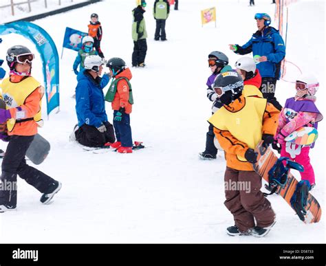 Children Learning Snowboarding And Skiing At Blue Mountain Collingwood