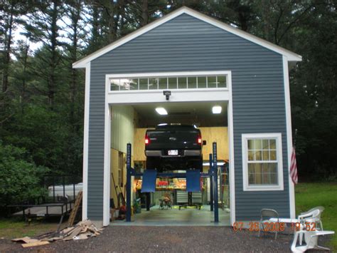 External Garage With 2 Car Lift Garage Remodel Modern Garage