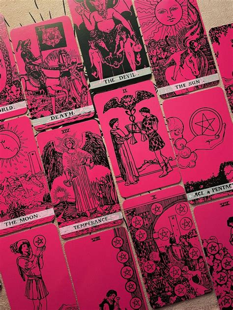 Pink Cards With Black Ink On Them That Have Pictures Of People In