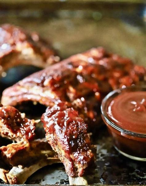 Best Oven Baked Baby Back Ribs Slathered With BBQ Sauce BBQSauce
