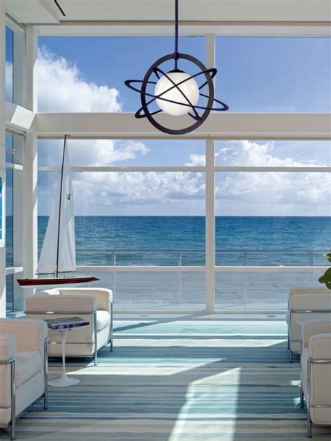 Install a floor to ceiling sliding glass door to brings a seamless transition from the indoors and outside. From the masthead: Rooms with and ocean blue view