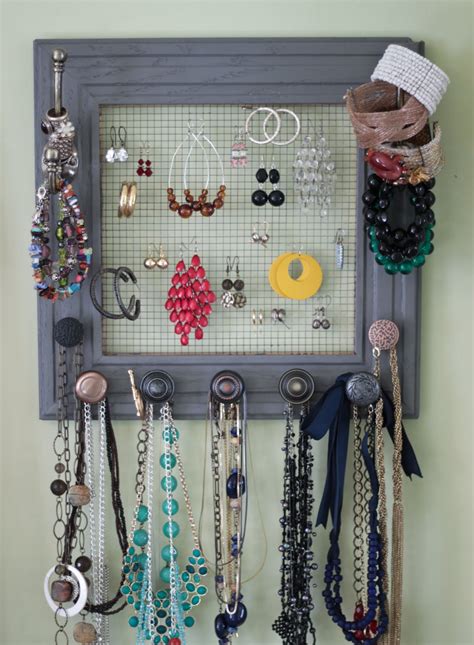 This picture hanger made from scrap wood displays your favorite photo, art or poster. Rach's Blog: DIY Jewelry Box On My Wall
