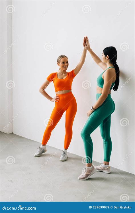 Fit Young Woman Giving High Five To Friend After Workout In Class Stock Image Image Of Giving