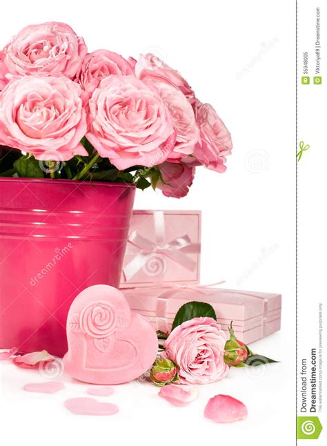 Bouquet Of Pink Roses And Ts Isolated On White Stock