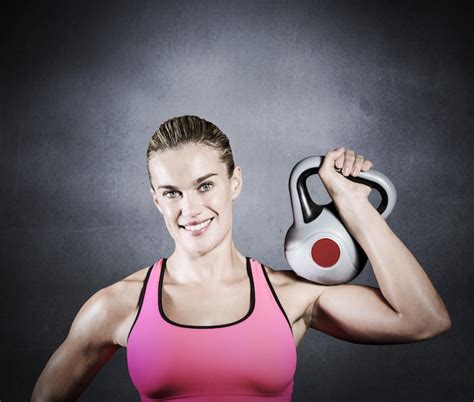 Premium Photo Composite Image Of Muscular Woman Lifting Heavy Kettlebell