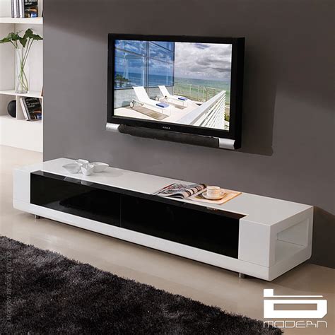 This solution leans a bit more modern and minimal in its approach but is the same concept as above. b-modern Editor & TV Stands, White | MetropolitanDecor