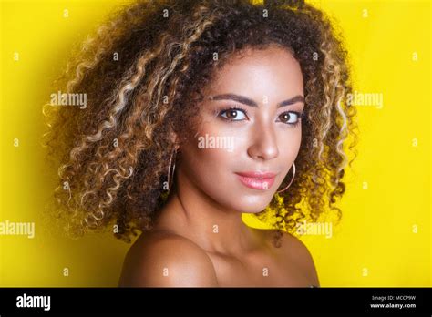 Beauty Portrait Of Young African American Girl With Afro Hairstyle