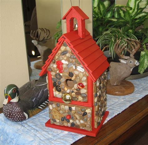 Finding medical and recreational cannabis dispensaries near you? Birdhouse with stones and river rock collected from the ...