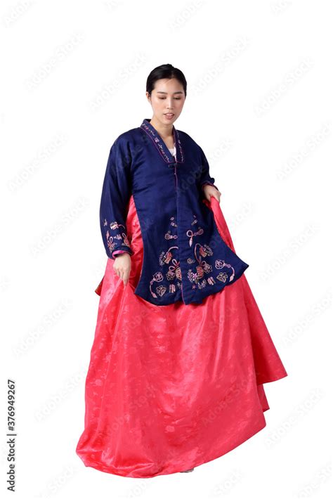 a beautiful asian woman wearing hanbok is the national dress of korea white background