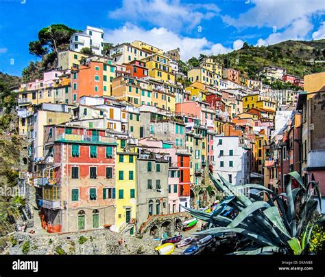 Colorful Houses Stacked On The Cliffs In Riomaggiore Cinque Terre
