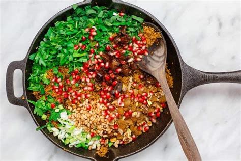 couscous recipe jeweled with pomegranate nuts the mediterranean dish